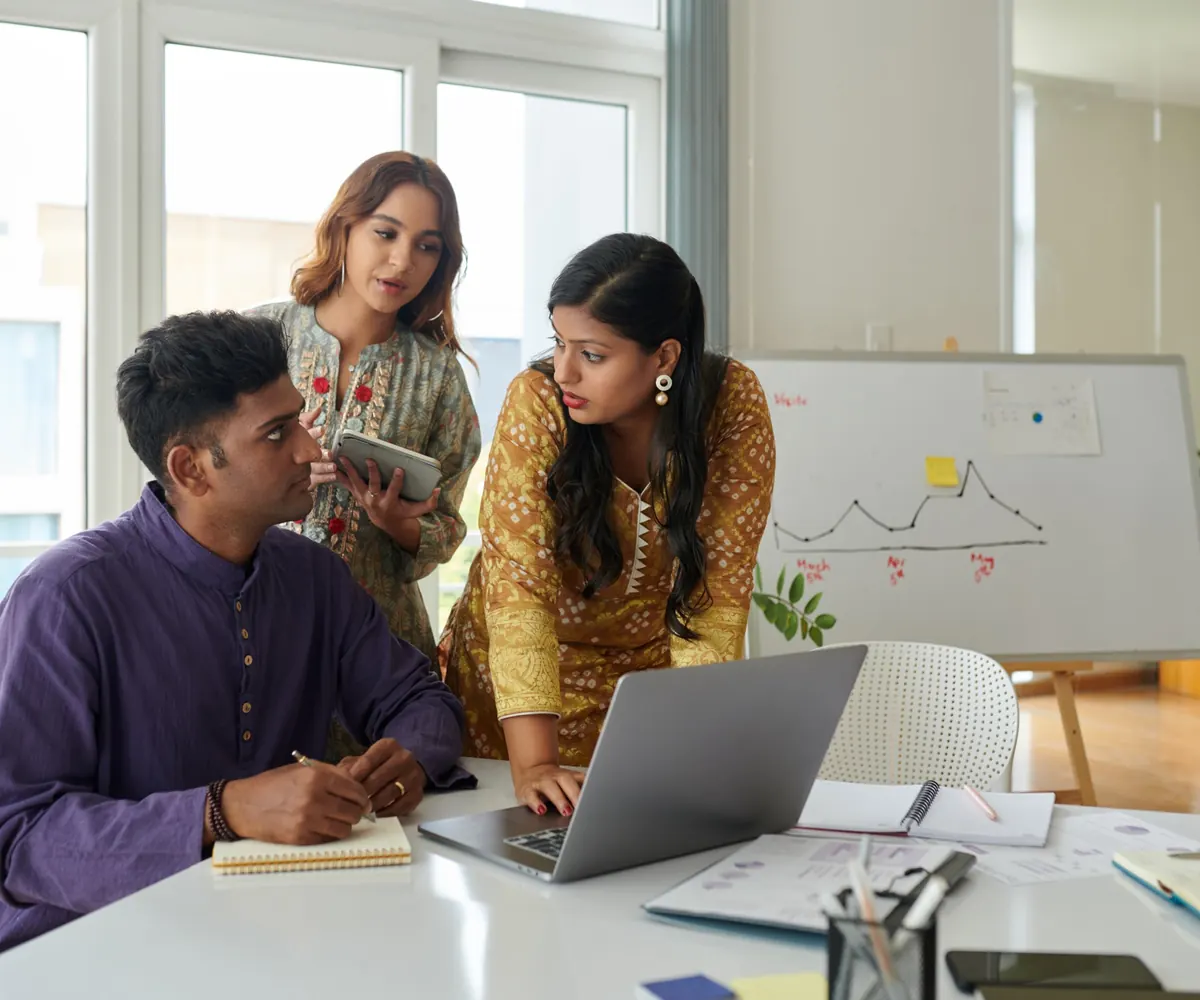 PPC agency India team reviewing Google Ads campaign performance on a laptop